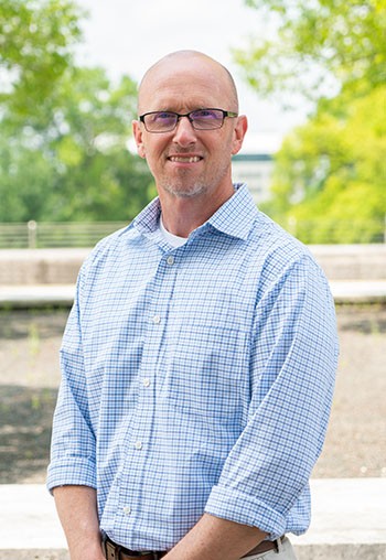 Headshot of Chris Pianta Photo of Kristen Privette