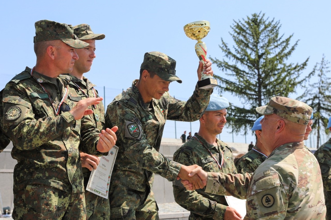 During the awards ceremony for the Bulgarian Armed Forces’ first multinational Best Warrior Competition, Maj. Gen. Warner Ross, Tennessee’s Adjutant General, congratulates the Bulgarian Land Forces team for winning first place in the competition held at the Vasil Levski National Military University, June 23-26. (photo by Capt. Kealy Moriarty) During the awards ceremony for the Bulgarian Armed Forces’ first multinational Best Warrior Competition, Maj. Gen. Warner Ross, Tennessee’s Adjutant General, congratulates the Bulgarian Land Forces team for winning first place in the competition held at the Vasil Levski National Military University, June 23-26. (photo by Capt. Kealy Moriarty)