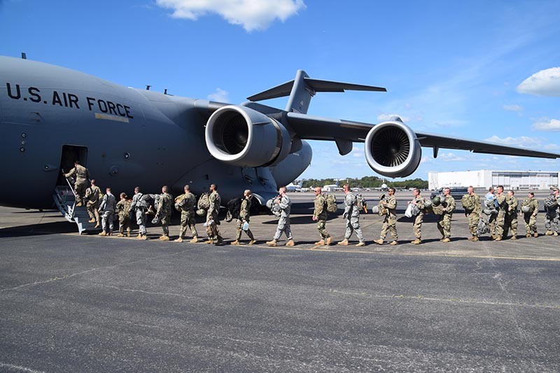 Members of the 252nd Military Police Co., 117th MP Battalion, Tenn. Army National Guard climb aboard a Tenn. Air Guard C-17 Globemaster out of Memphis bound for the US Virgin Islands.  The 252nd MP Co. will assist local authorities in the USVI with various tasks such as point of distribution (POD) security and traffic control along major roadways.  (Tenn. National Guard photo by CW4 Nick Atwood) 