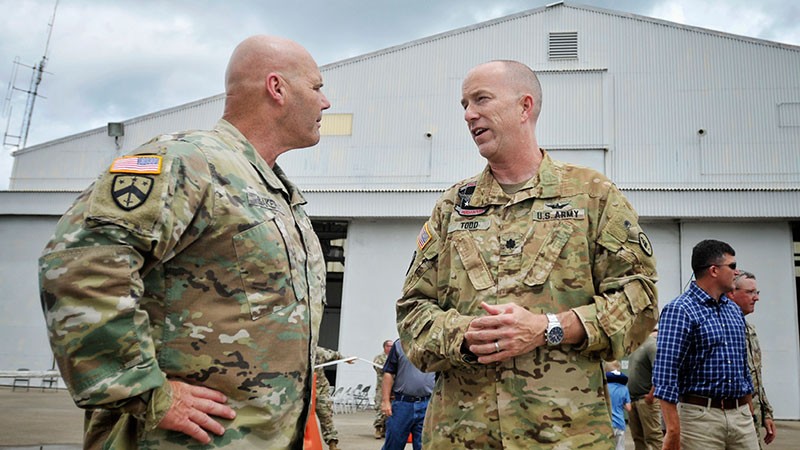 Tennessee’s Deputy Adjutant General, Maj. Gen. Tommy Baker (L) talks with 1-230th Assault Helicopter Battalion Commander, Lt. Col. Steve Todd (R) 