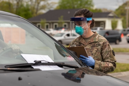 Sgt. Leann Roggensack, a field artilleryman with the 278th Armored Cavalry Regiment, works as a registered nurse in her civilian occupation. She is one of many Tennessee Guardsmen who have volunteered to help test Tennessee residents for COVID-19. (Photo by Sgt. Sarah Kirby).