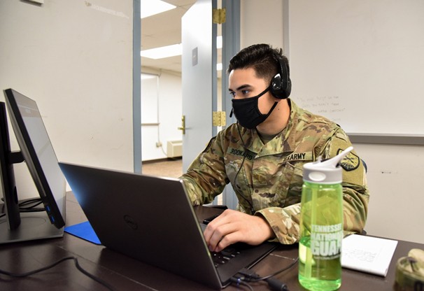 Soldier working at a computer