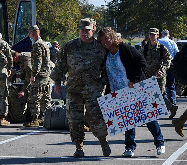 Families, friends, and fellow service members gathered to greet Tennessee National Guardsmen as they return home from a yearlong deployment, Nov. 1, at Smyrna’s Volunteer Training Site. Members of the 913th Engineer Company and the 269th Military Police Company deployed supporting operations near Laredo, Texas. (Photo by Edgar Castro)