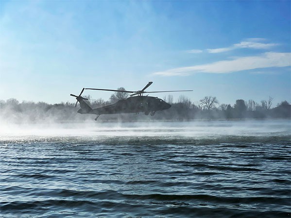 Members from Tennessee National Guard’s 1-230th Assault Helicopter Battalion and Nashville Fire Department held a joint exercise to practice hoist operations at Old Hickory Lake between Goodlettsville and Hendersonville on Dec. 14. (Photo by Capt. Kealy Moriarty)