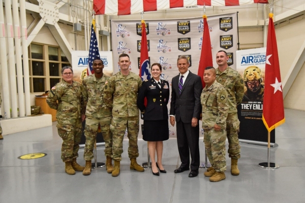 Members of the Tennessee National Guard Education and Incentives Office pose with Gov. Bill Lee, May 17, after he signed an amendment to the Tennessee STRONG Act, at Berry Field Air Force Base, in Nashville. The new legislation affords more educational opportunities for members of the Tennessee National Guard, to include payment for attending Tennessee Colleges of Applied Technology and reimbursement towards tuition for graduate degrees. (Photo by Staff Sgt. Timothy Cordeiro)