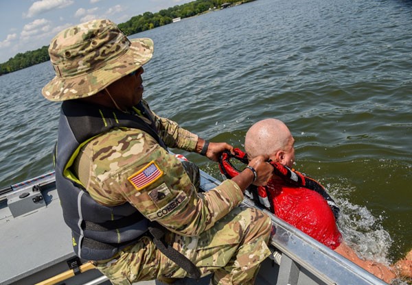 Tennessee National Guardsman work with members of the Williamson County Emergency Management Agency during a water rescue exercise, August 5, at Old Hickory Lake, during Vigilant Guard 2021, a large-scale inter-agency exercise simulating a dangerous hurricane impacting communities across Tennessee. (Photo by Sgt. 1st Class Timothy Cordeiro)