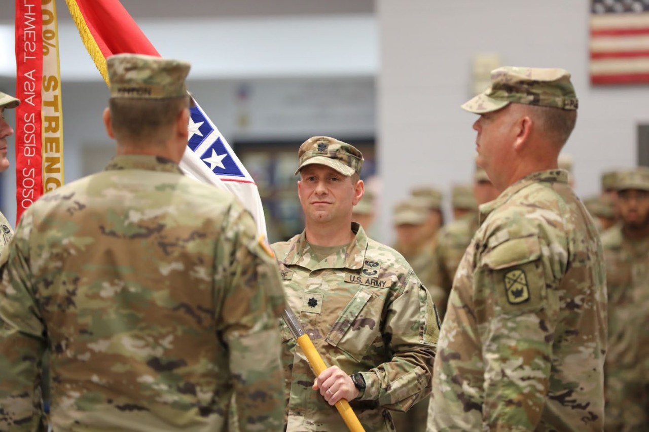 Lt. Col. Tony Glandorf, the new commander of the 194th Engineer Brigade, prepares to present the brigade colors to Command Sgt. Maj. Michael Plemons, during the 194th’s change of command ceremony at Smyrna’s Volunteer Training Site on Friday, June 7. (photo by Capt. Kealy Moriarty)