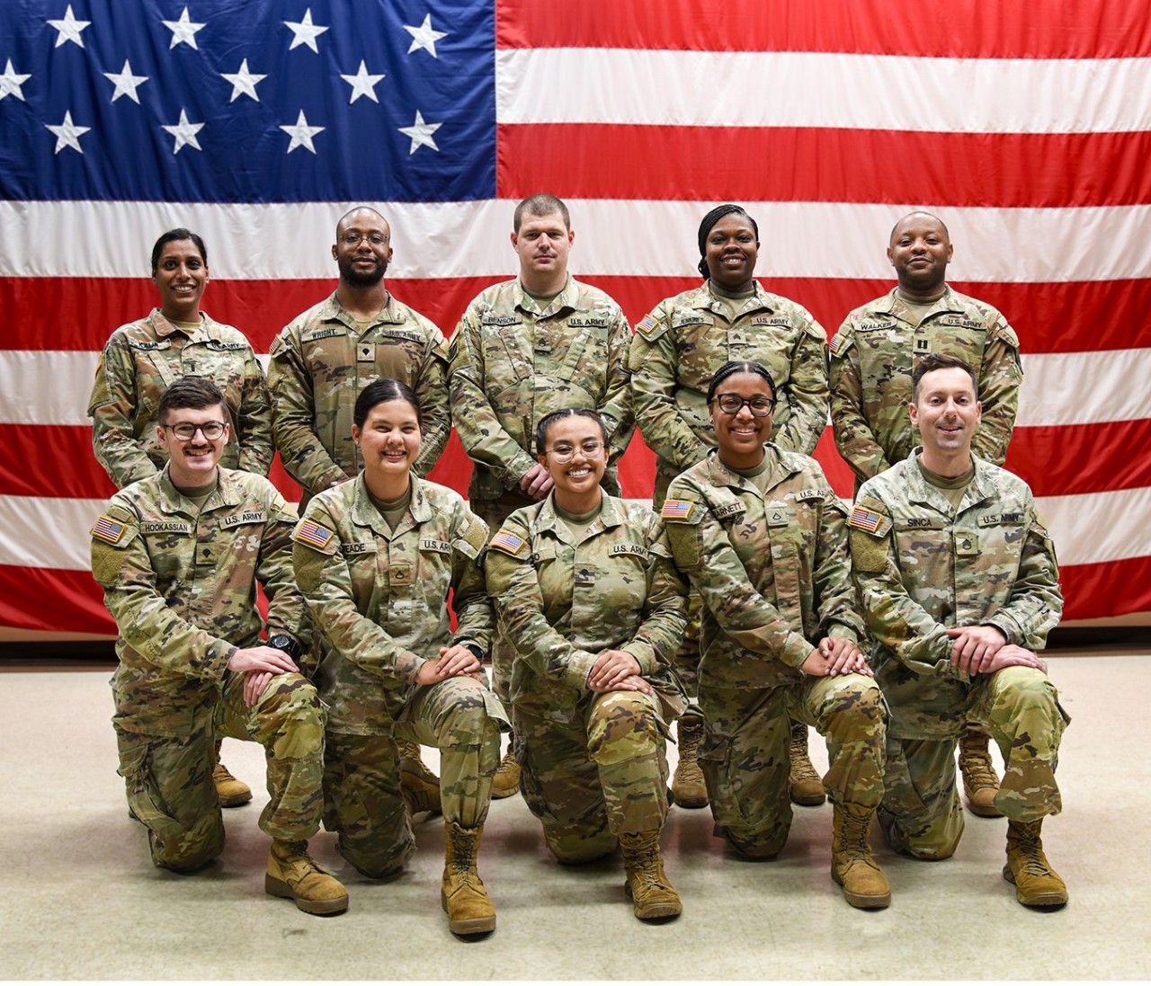 Soldiers from Nashville’s 1128th Finance Management Support Detachment pose for a photograph at the Tennessee National Guard’s Joint Forces Headquarters prior to departing Tennessee on Monday, September 2, on the first leg of a year-long deployment to Kosovo. (photo by Edgar Castro)  